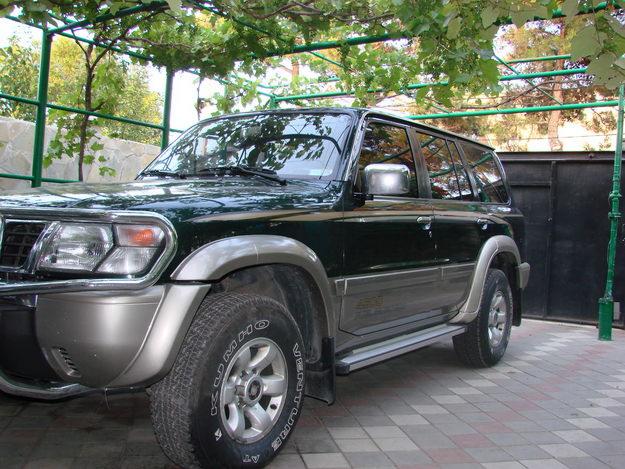 Nissan Patrol Y61: 7 фото